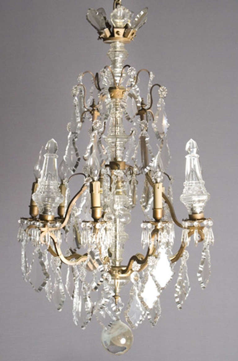 In perfect condition and working crystal chandelier made in France, circa 1860. Special are the three crystal peaks on this chandelier.
The framework is made of bronze. Six lights and a massive ball on the bottom complete this chandelier.