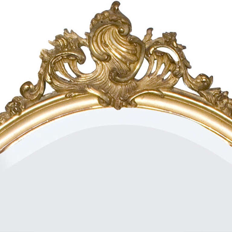 Beautiful original Rococo mirror. The frame is gold gilded and the original glass is facet cut. Made circa 1880 in France
