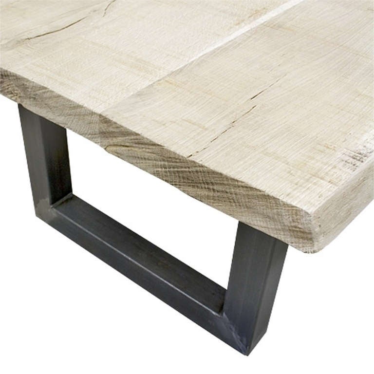 This tree-trunk table literally has a slice of an oakwood as top. The top is finished with a 2-component varnish, which protects the top against dirt and spots but is not visible.
The top is 5 cm thick and the sides follow the shape of the trunk,