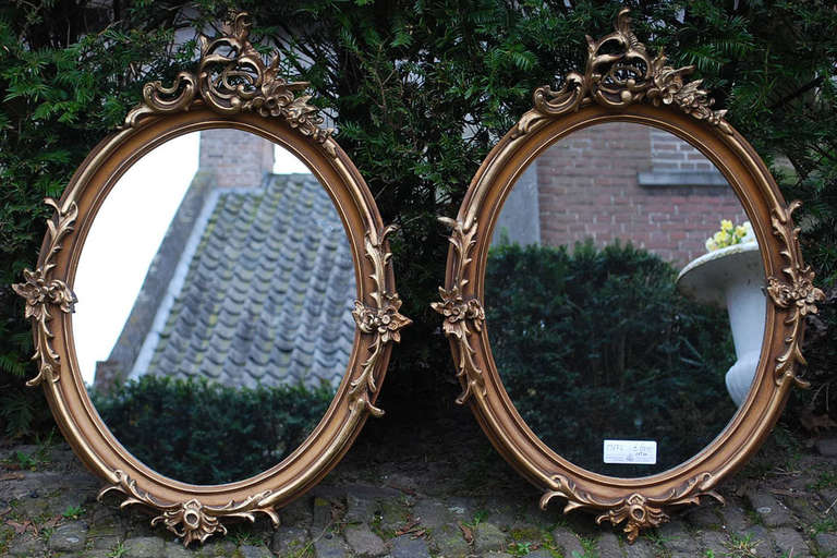 Set of 2 19th c. gold gilded Rococo / Louis Quinze mirrors.
Originates France, dating app 1880.