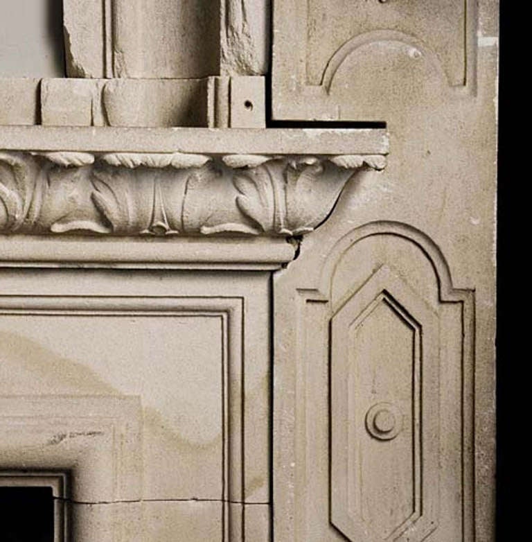 Beautiful ornamented fireplace carved out of limestone. This fireplace is made, circa 1830 in France.
Excluding mirror and statue.