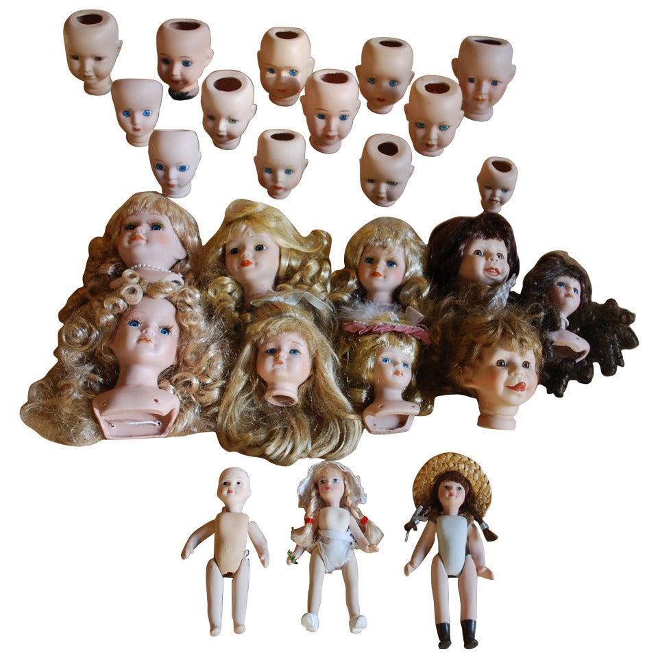 Têtes de poupées en porcelaine ancienne du XXe siècle