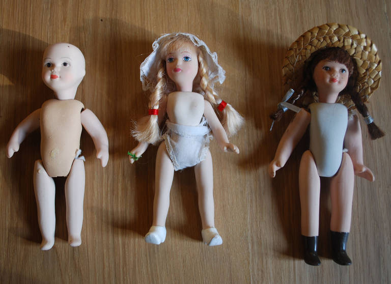 Milieu du XXe siècle Têtes de poupées en porcelaine ancienne du XXe siècle en vente