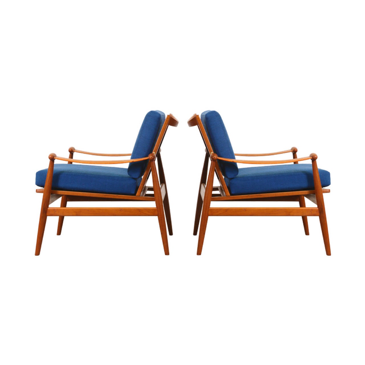 Finn Juhl model #133 “Spade” teak lounge chairs for France & Son.