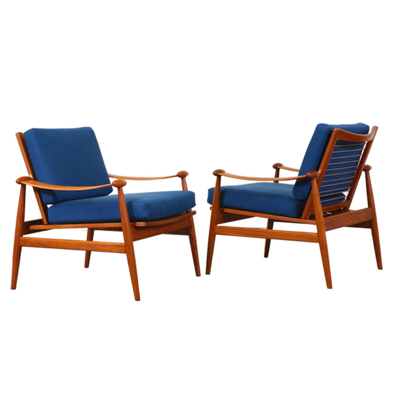 Finn Juhl Model #133 “Spade” Teak Lounge Chairs for France & Son