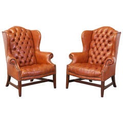 Brass Tacked Tufted Leather High Back Wing Chairs