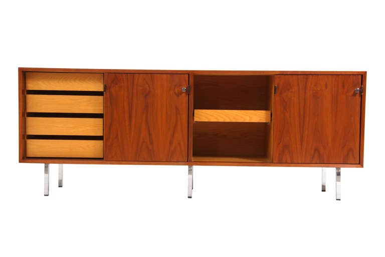 Mid Century walnut credenza with leather pulls by Florence Knoll.