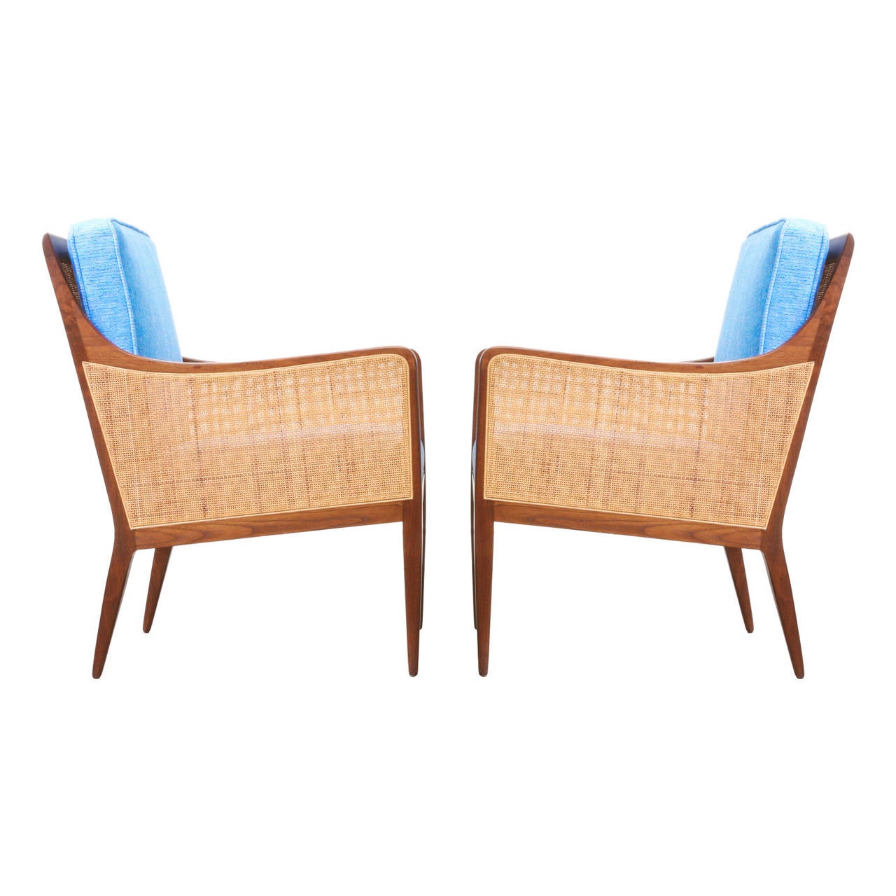 Designer: Kipp Stewart.
Manufacturer: Directional.
Period or style: Mid-Century Modern.
Country: United States.
Date: 1950s.

Dimensions: 32.75″ H x 23.75″ W x 25.5″ D.
Seat height: 17.5″.
Materials: Walnut, cane.
Condition: Excellent,