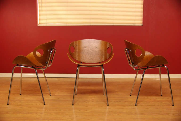 Vintage molded teak plywood chairs with floating seats and chrome frames. Designed in Finland by Ola Kettune for J. Merivaara.
