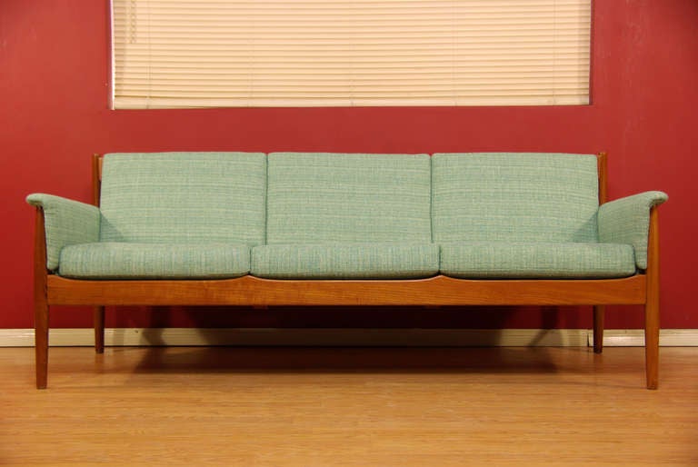 Beautiful teak Danish sofa designed by Grete Jalk for France & Son.
 