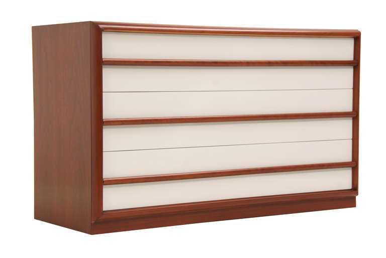 Designer: T.H. Robsjohn-Gibbings
Manufacturer: Widdicomb
Period/Style: Mid Century Modern
Country: United States
Date: 1950′s

Dimensions: 30.5″H x 51.25″L x 20.5″W
Materials: Walnut, Off White Lacquer
Condition: Excellent – Newly
