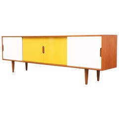 Danish Low Profile Teak and Lacquered Credenza by Knud Nielsen