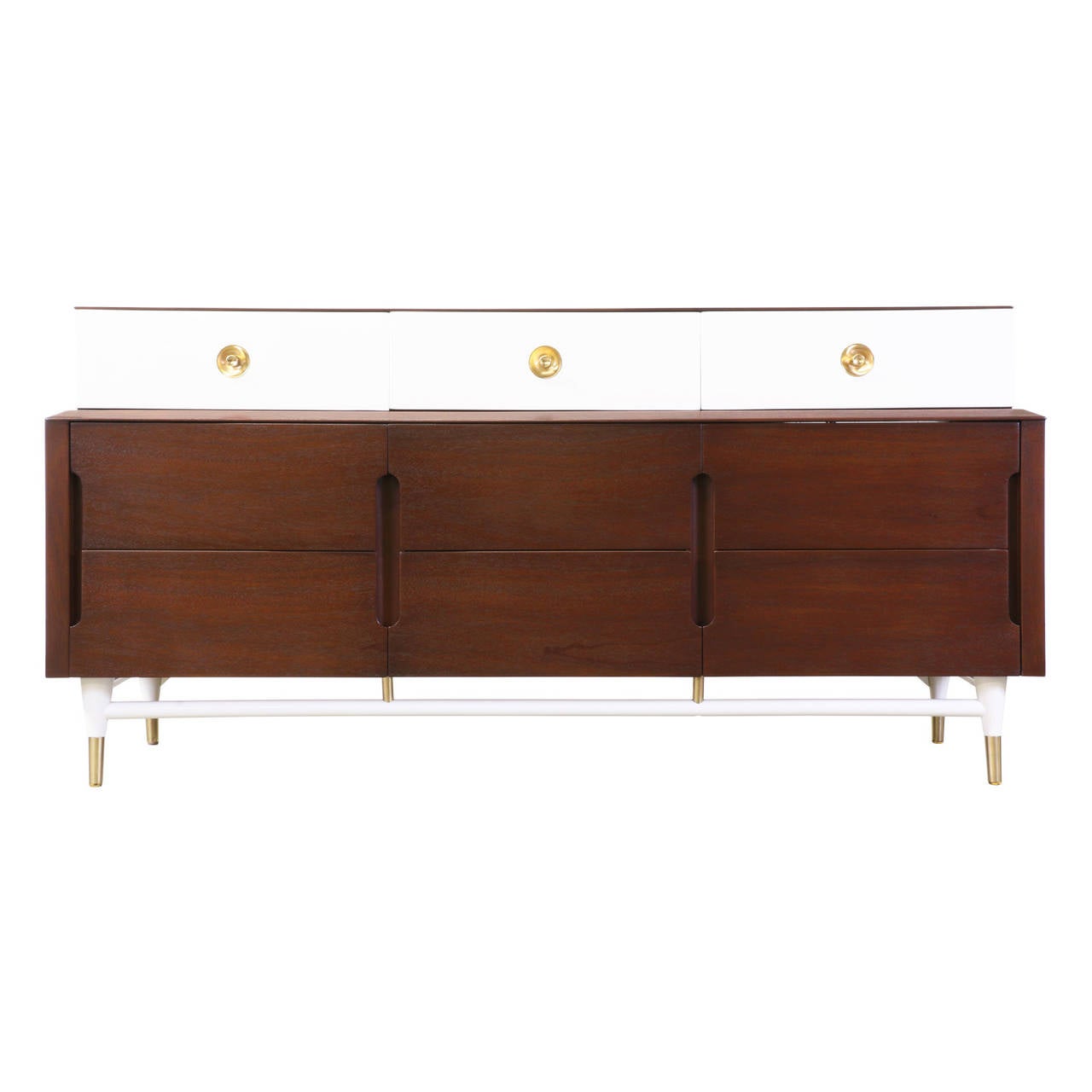 Designer: Basic Witz Furniture Industries
Manufacturer: Basic Witz Furniture Industries
Period/Style: Mid Century Modern
Country: United States
Date: 1960’s

Dimensions: 31.25″H x 64.25″L x 19.5″W
Materials: Walnut, Lacquer, Brass
Condition: