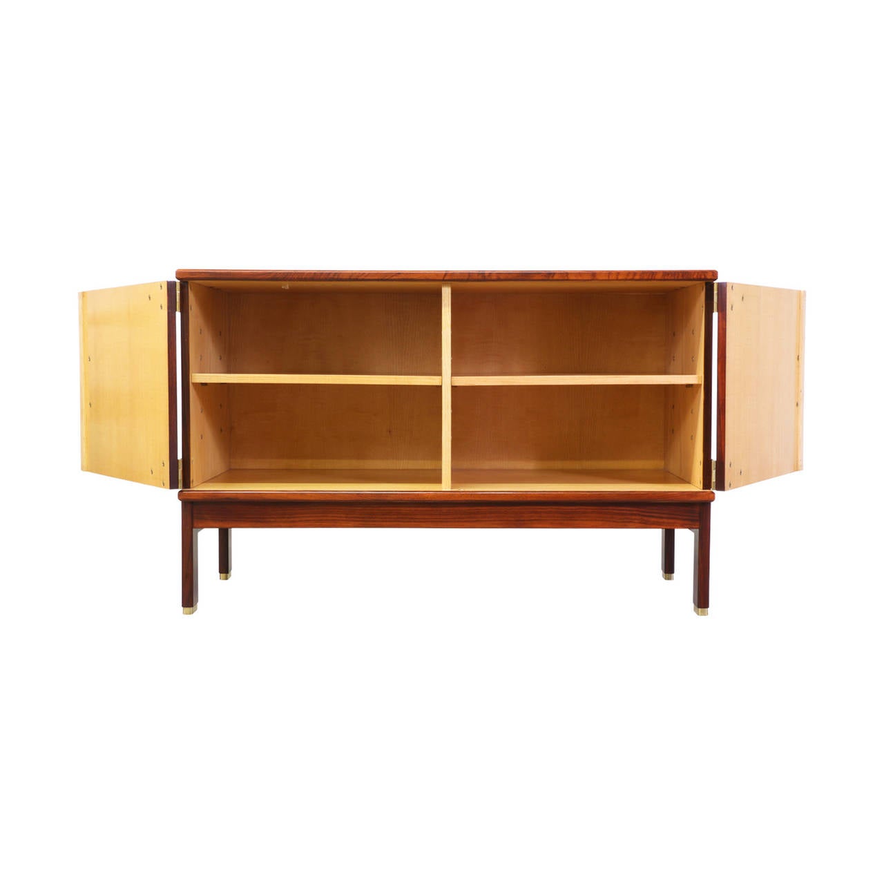 Designer: Unknown
Manufacturer: Unknown
Period/Style: Danish Modern
Country: Denmark
Date: 1960s

Dimensions: 29.75″H x 49.5″W x 21.75″D
Materials: Rosewood, Brass, Birch
Condition: Excellent – Newly Refinished
Number of Items: 1
ID Number: