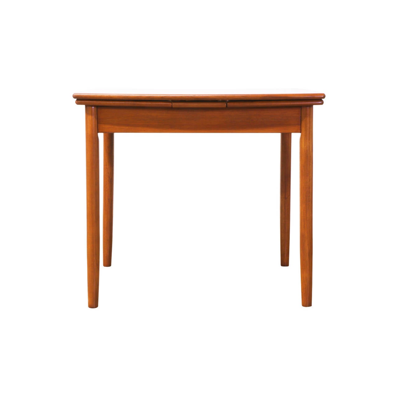 Designer: Unknown
Manufacturer: Unknown
Period/Style: Danish Modern
Country: Denmark
Date: 1960’s

Dimensions: 29″H x 3.5″W x 33.5″W
Extension Leaves 12.5″
Total Extension 58.5″
Materials: Teak
Condition: Excellent – Newly