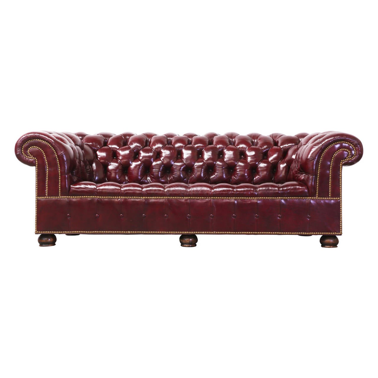 Designer: Unknown.
Manufacturer: Unknown.
Period/Style: Modern.
Country: United States.
Date: 1970s.

Dimensions: 29″ H x 85″ L x 32″ W
Seat height.
Materials: Leather, walnut.
Condition: Excellent, shows nice patina overall.
Number of