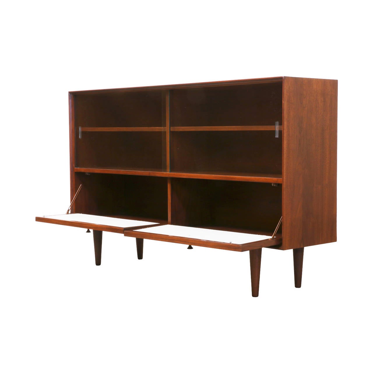 Designer: Unknown
Manufacturer: Unknown
Period/Style: Mid Century Modern
Country: United States
Date: 1950s

Dimensions: 34″H x 54″L x 13″W
Materials: Walnut, Glass
Condition: Excellent – Newly Refinished
Number of Items: 1
ID Number: