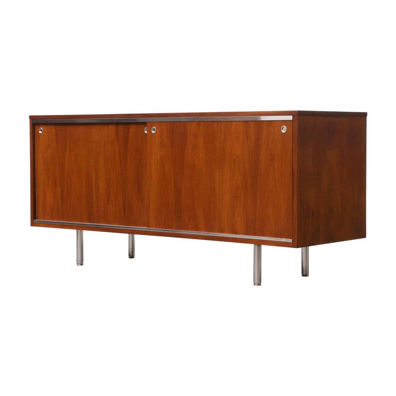 Designer: George Nelson
Manufacturer: Herman Miller
Period/Style: Mid Century Modern
Country: United States
Date: 1950s

Dimensions: 24″H x 56″L x 19″W
Materials: Walnut, Aluminum
Condition: Excellent – Newly Refinished
Number of Items: 1