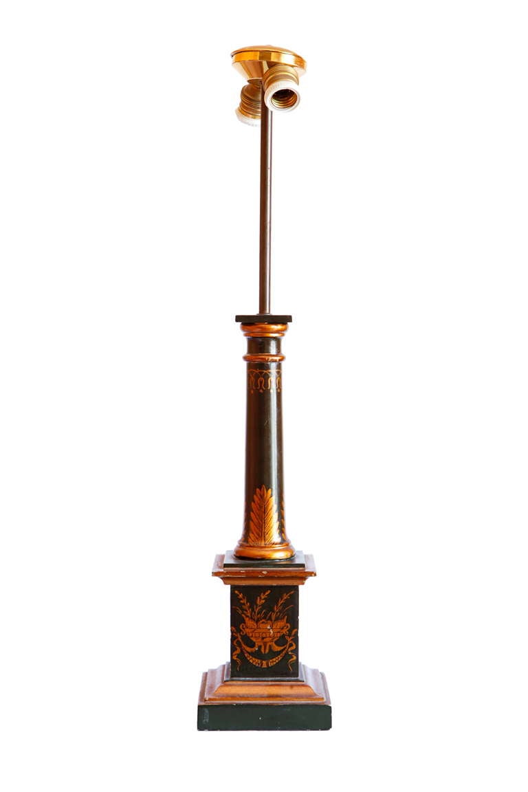 A Neoclassical Style Green And Gold Painted Column Form Table Lamp By Pierre Lotier