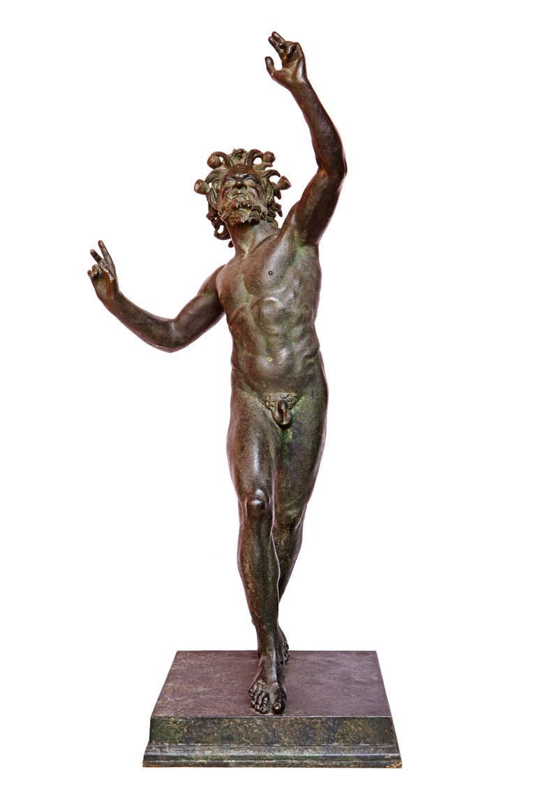 A patined bronze Dancing Faune on a square base.
After the Antique, 20th century, indistint stamp Naples Chiurazzi.