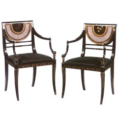 Pair of regency style japanned armachairs by Pierre Lotier