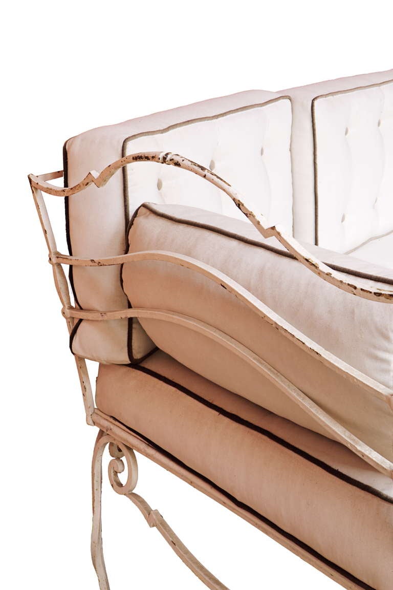 A french white-painted and wrought-iron sofa by Charles Moreux