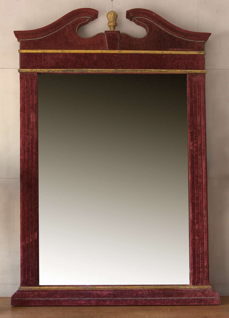 A French Parcel-Gilt and red velvet mirror