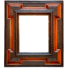 Antique A North European Ebonised and Fruitwood Mirror