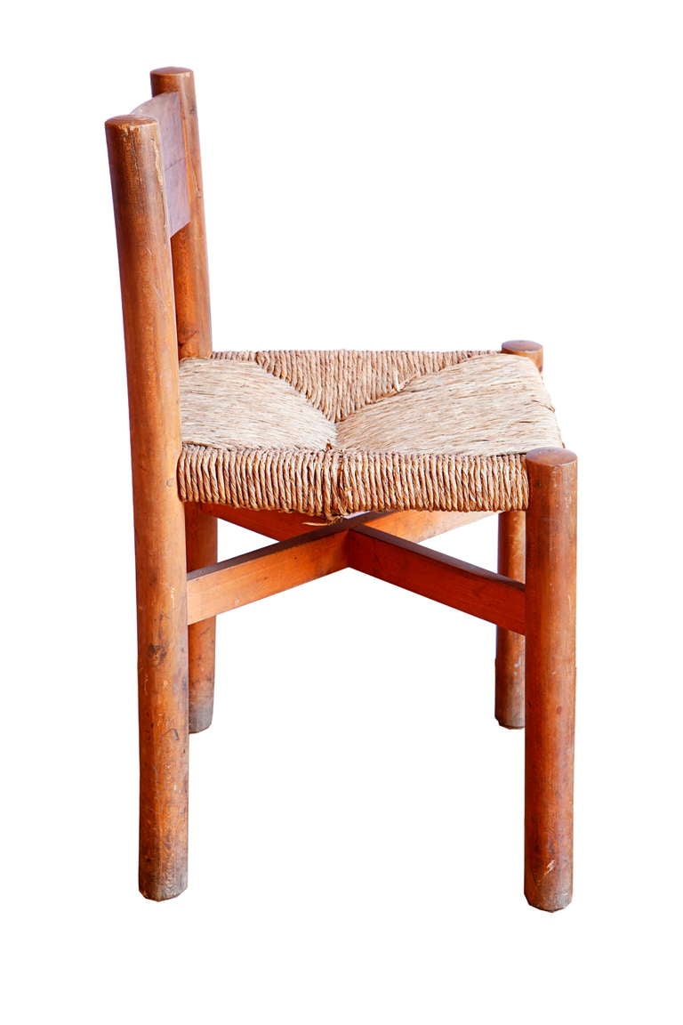 20th Century Pair of French Beechwood Side Chairs and Stools by Charlotte Perriand For Sale