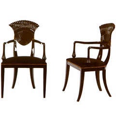 A Pair of French Ebonised Armachairs