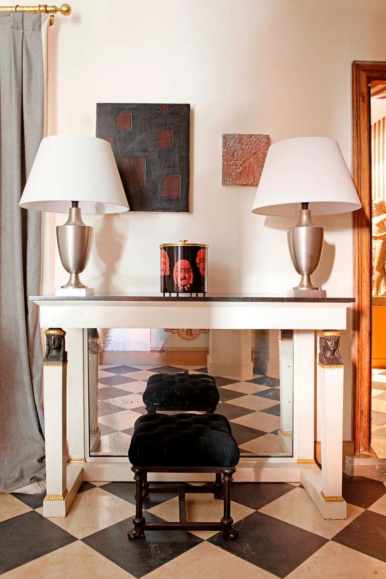 An italian eboniced brass ice bucket by Fornasetti