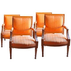A Set of Four French Louis XV Fruitwood Armchairs