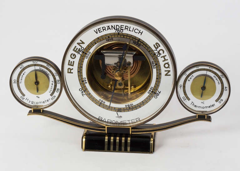 1930s German Aneroid Barometer, Hygrometer, and Thermometer .
Made by Lufft.  Gold plated trim and enamel.  Very nice!
Complimentary shipping.