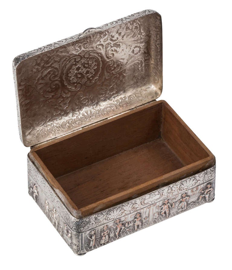 C. 1920s Silver over copper box, embossed with figural scenes.  Interior is lined with wood, probably for cigarette.  Could be used for jewelry.