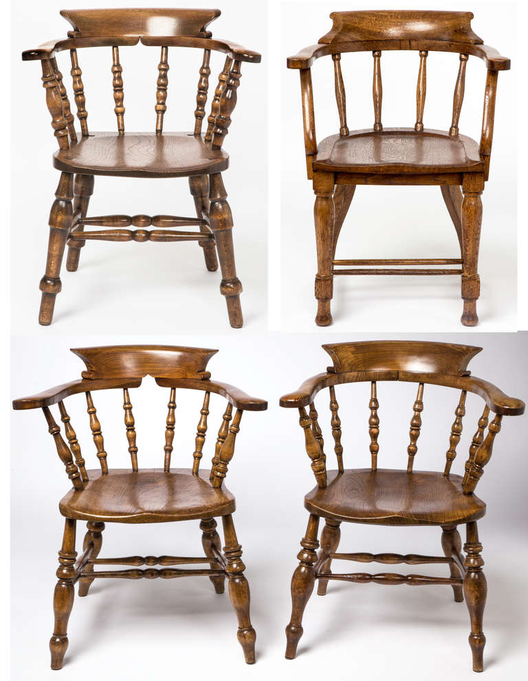 Four individual English style captain or pub chairs.  Each one slightly different. But will work well together.   All similar sizes.  Solidly built for comfort.
Very comfortable and sturdy.  Turned legs and seat made from solid single piece of