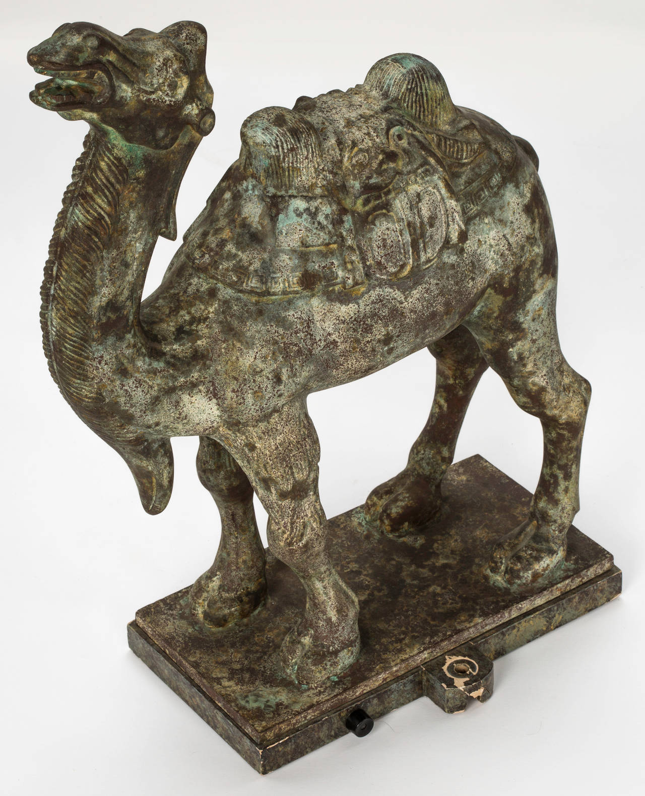 C. 1920s, Italian lost wax cast bronze camel.  Very stately decorative piece.
As per photo shown of the base, there is a place for a post for wiring.  I believe at one time it was made into a lamp