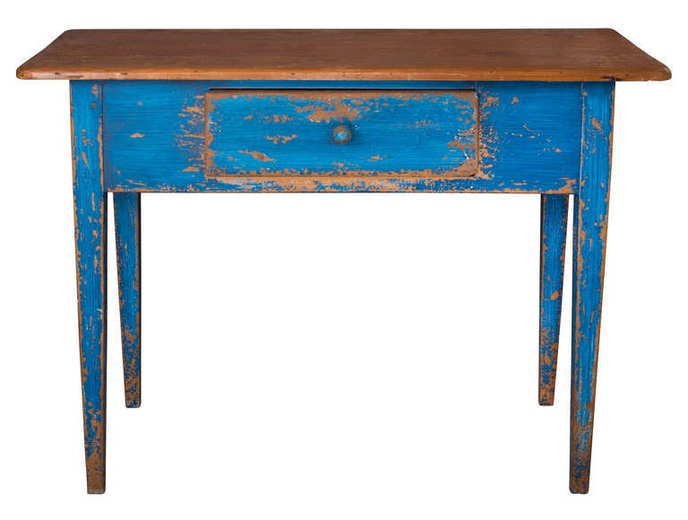 Early 1800s, Small Charming desk table.  Base is painted bright blue and the top is natural.  One drawer decorative  table excellent next to bed.
Oak and pine.  21