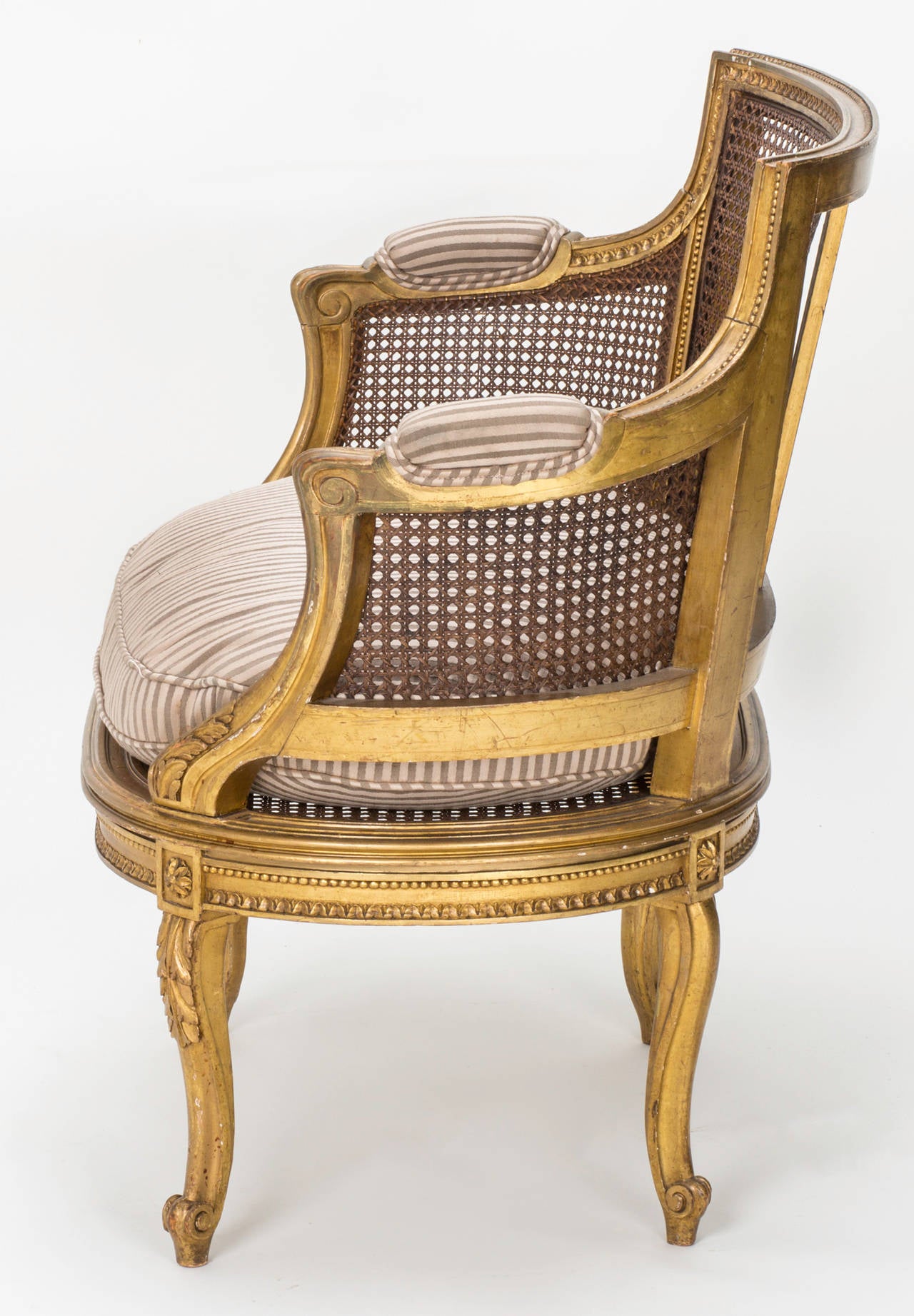 Early 20th Century Pair of French Giltwood Cane Armchairs