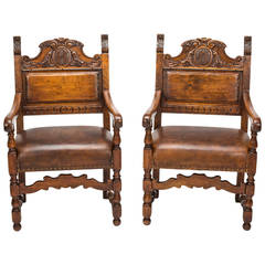 Pair of Hand-Carved Leather Armchairs