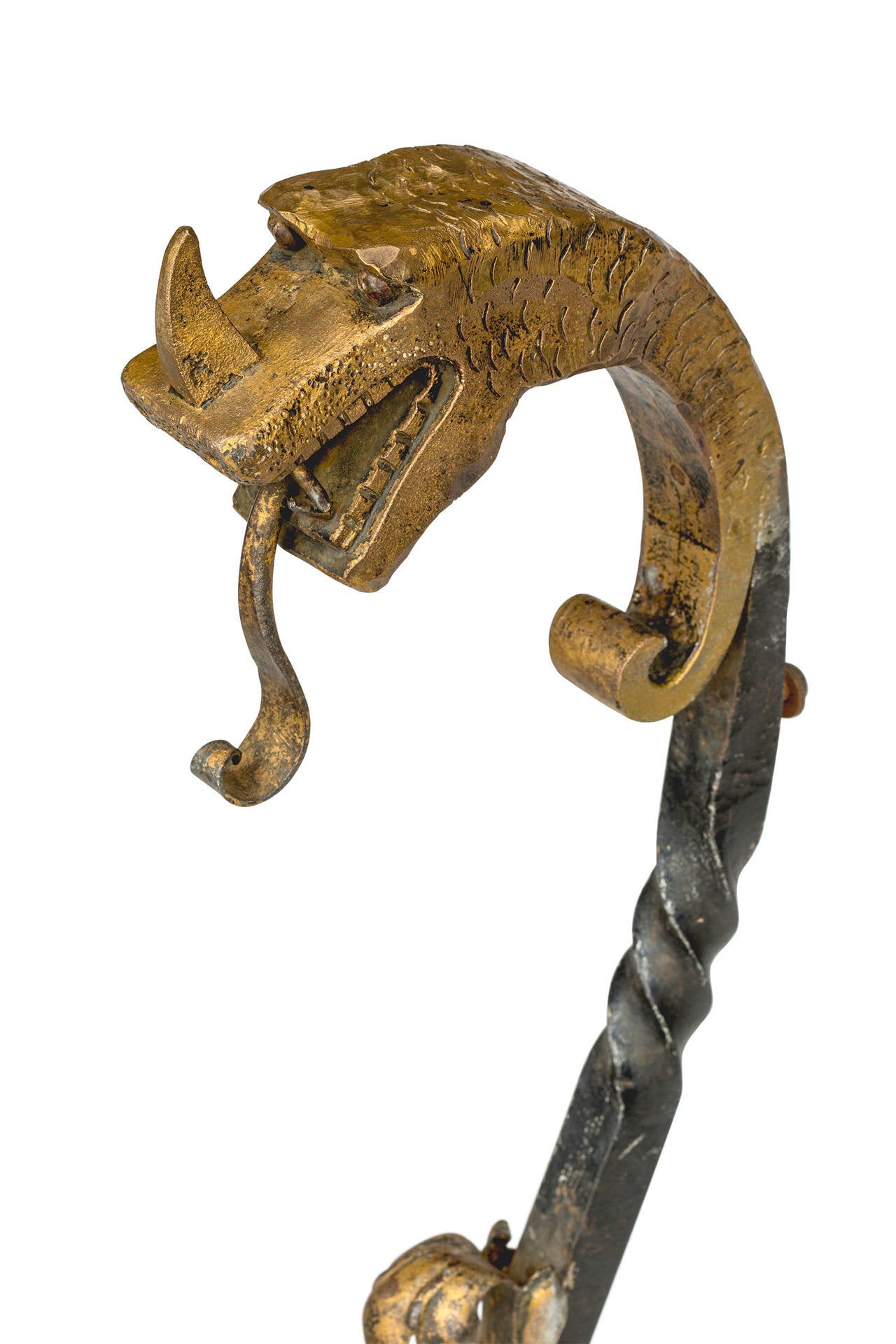 Pair of stylized bronze and iron dragon andirons.
Main structure is iron, the head and the acanthus is bronze.