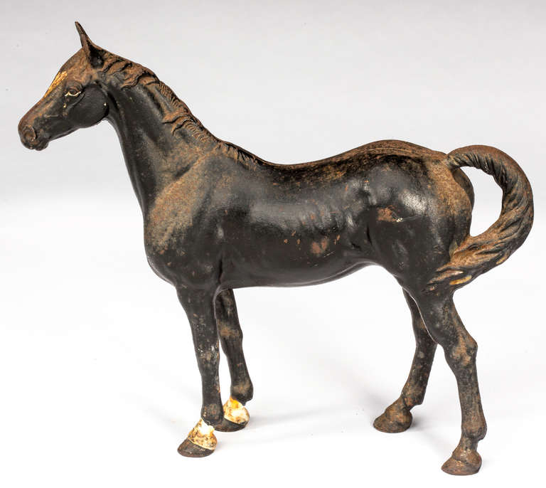 Extremely rare horse figured door stop, with its original painted finish, circa 1800s.