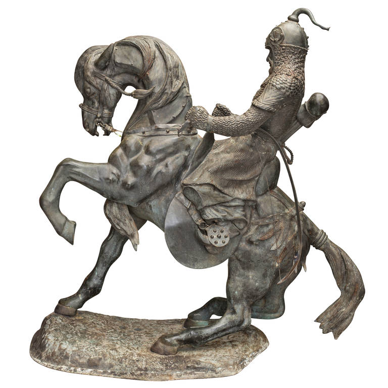 19th century, stately and dramatic sculpture of Genghis Kahn on horse, who became the emperor of Mongol Empire in 13th century. Superbly cast in bronze, wonderful details. Half lifesize. From a large estate in Montecito, California.