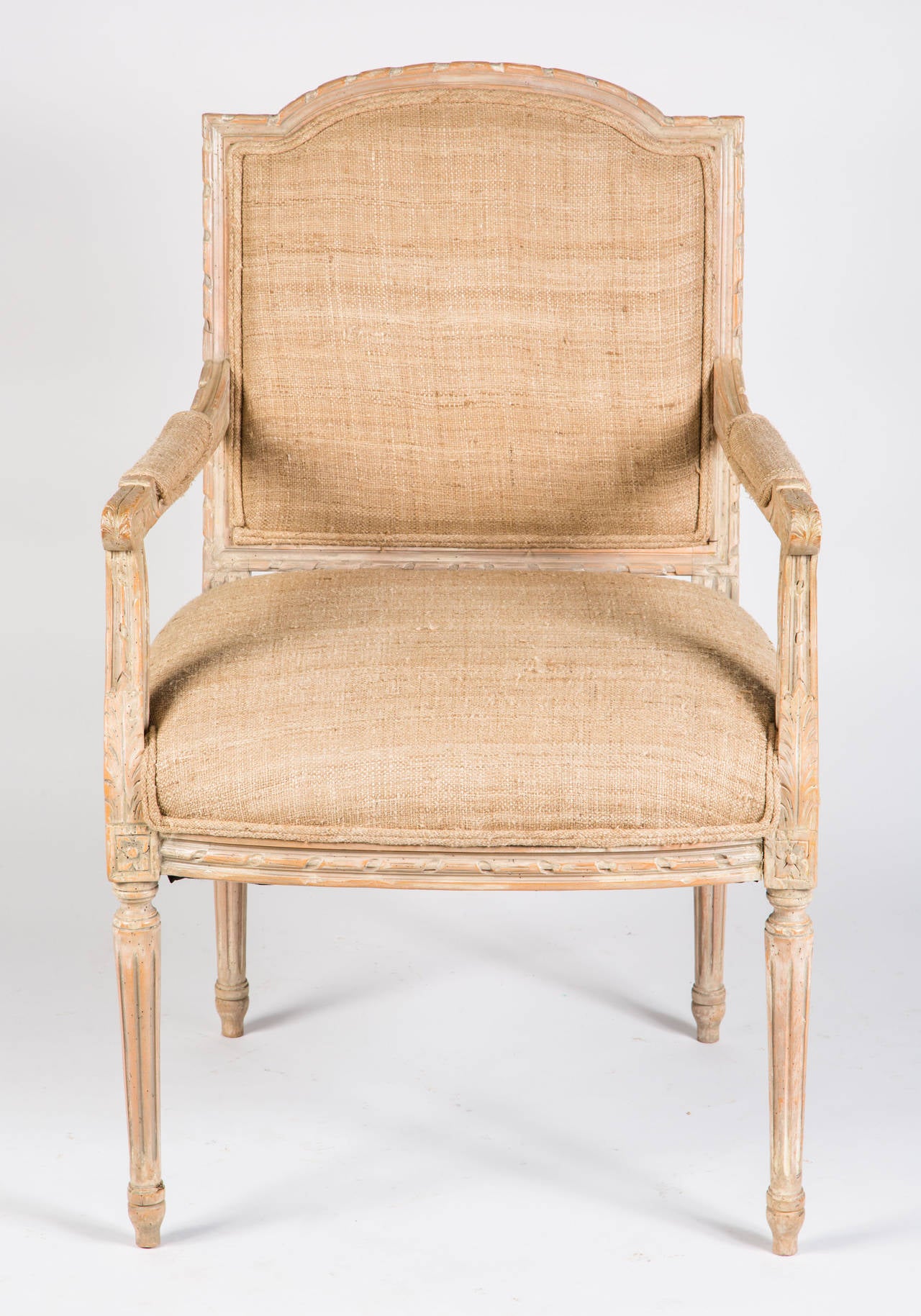 Comfortable arm chairs.  Newly upholstered in linen silk.  Sold indivispdually or as a set.