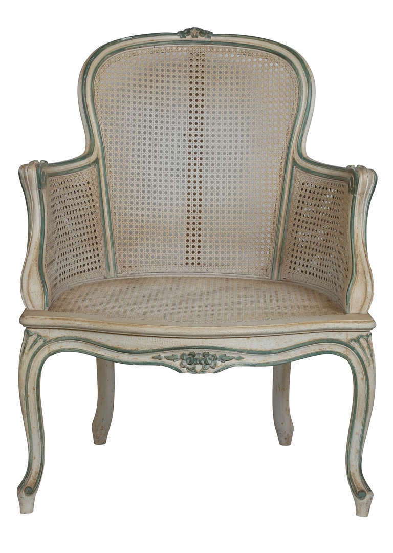 Beautiful and charming French Louis XV style chairs.
Nicely carved and painted in creme with blue liner.  These very comfortable chairs will be great as side chairs in your living room.  Cushions available.