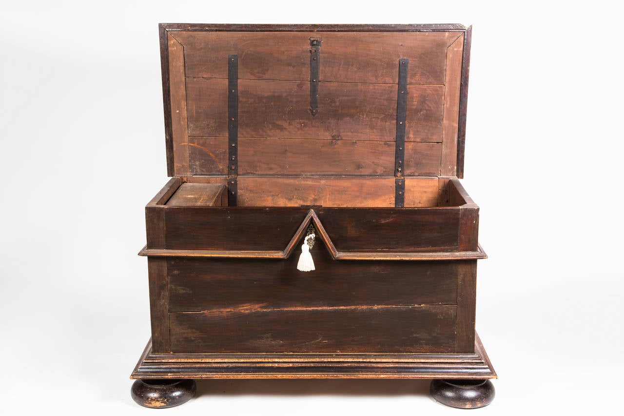 C. 1860, Belgium.  Wonderful large wood trunk for storage with small candle box inside.  Flat top can become a useful table top,
