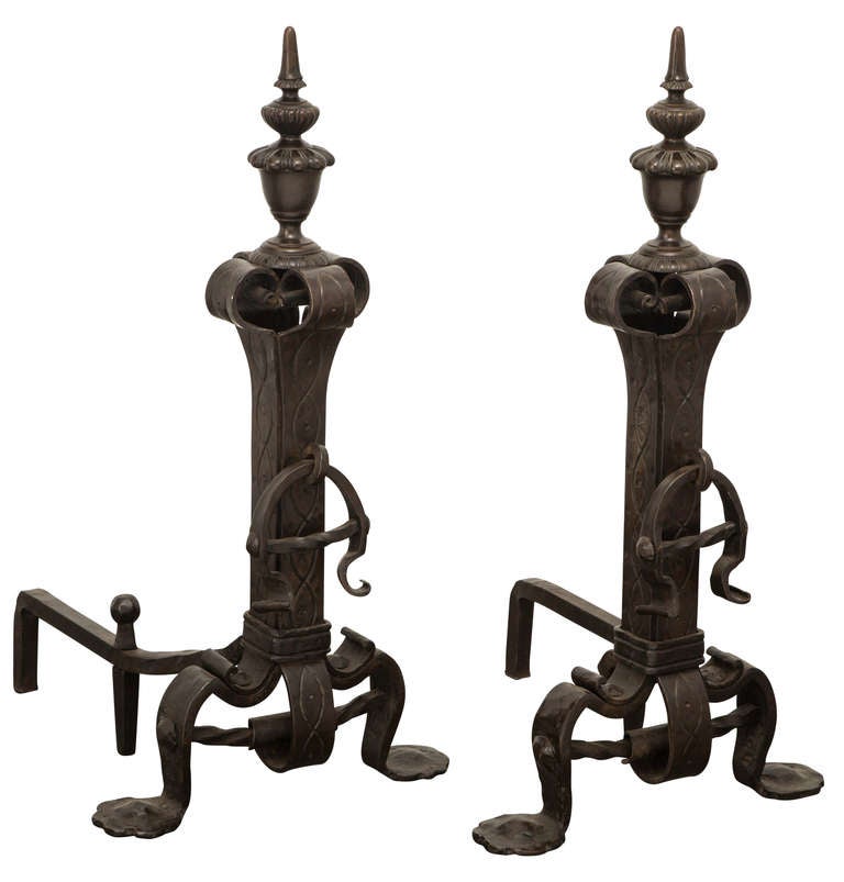 Fabulous Vintage 1940s pair of wrought andirons. Very handsome set, detailed finial top, 
Monumental in size.   Specified measurements are for each andiron.
Designers please contact us directly with your direct email.