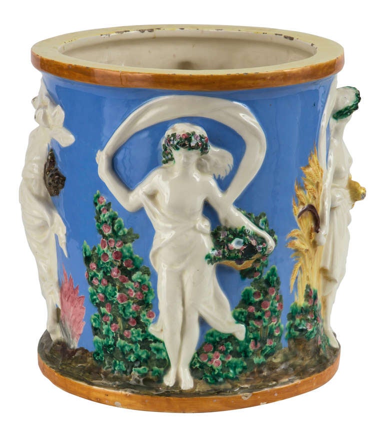 Vintage 1930s.  Italian Della Robia large scale pot.  Wonderful  coloration of women depicting four season in relief forms.  Bright glazes are lightly crackled  and chipped, lending to its charming  patina that which only comes by age.