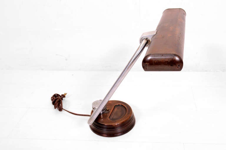 For your consideration a desk lamp produced by Faries. 

The base and the shade appears to be copper or copper-plated with stainless steel hardware. Brass push on and off switch. 

Beautiful vintage patina.