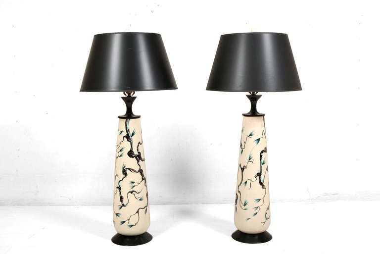 For your consideration a pair of table lamps with oriental motif. Large ceramic base with nice graphics and vintage glaze finish, mounted on ebonized wood. Shade are not included, just for prop only. 

Lamp to the base of socket 29 1/2" H,