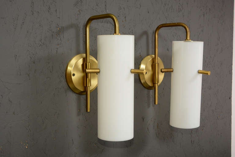 For your consideration a pair of wall sconces. Brass body with case glass diffuser. 

Great lighting. 

Unmarked.